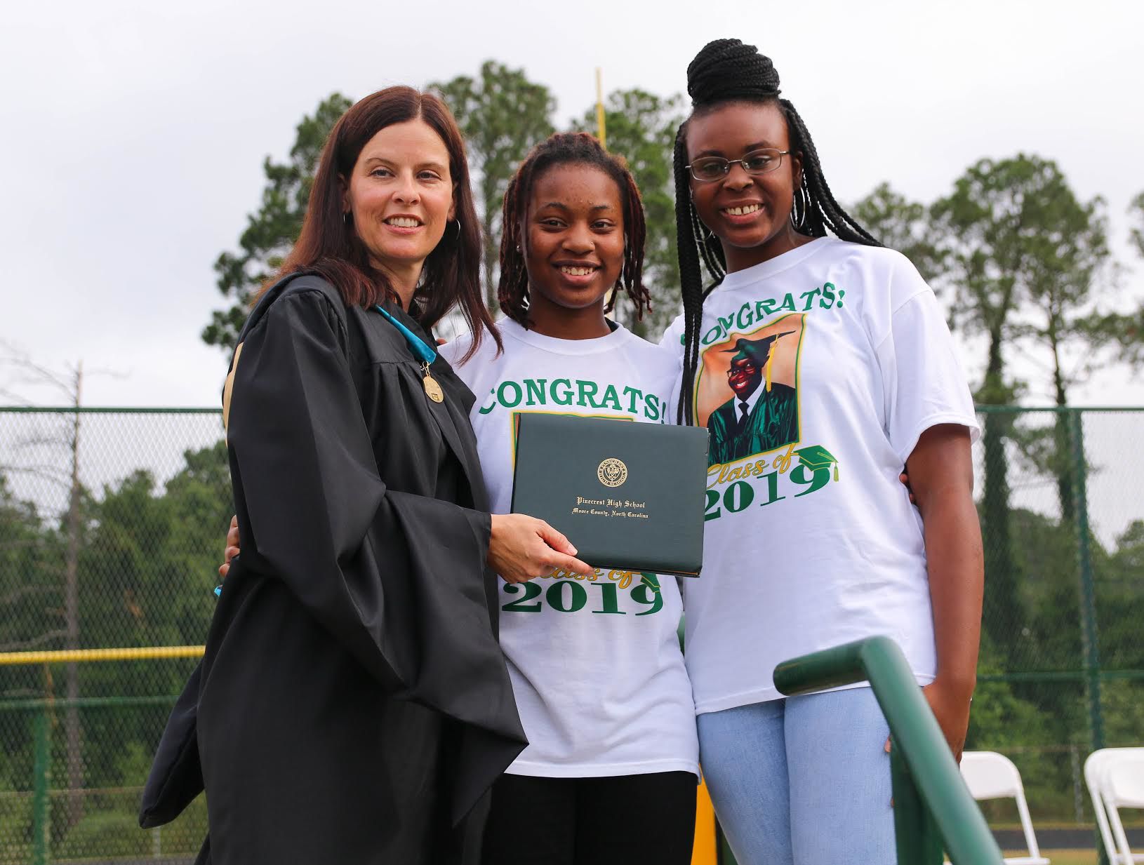 Purcell Cousins Accept Diploma